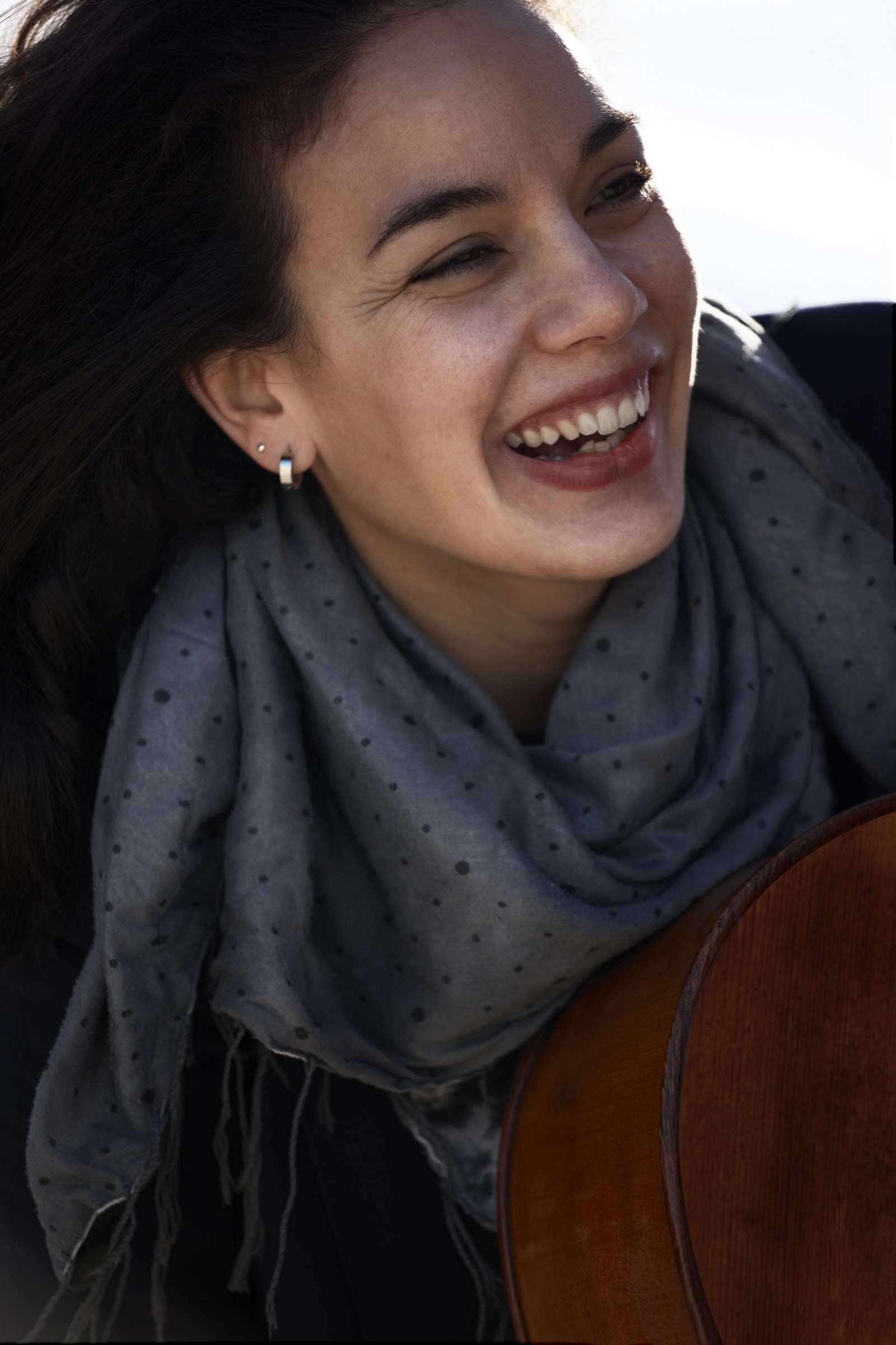 Woman laughing outdoors